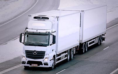 White commercial vehicle on the road